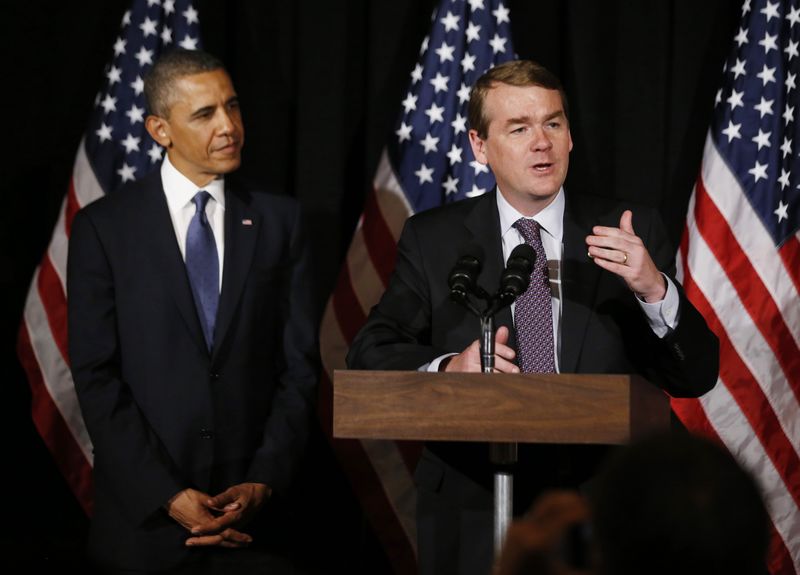 © Reuters. File photo of U.S. Senator Bennet  introducing U.S. President Obama  in Atlanta