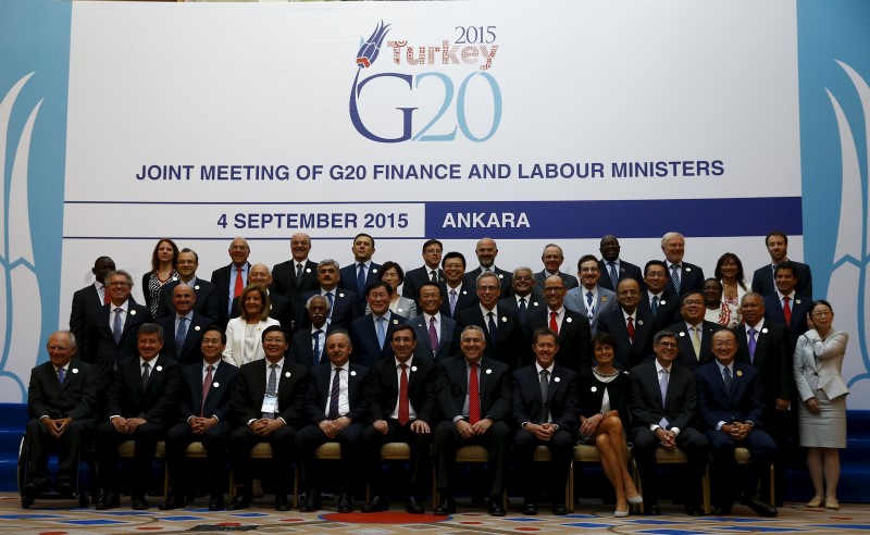 © Reuters. Finance and labour ministers gather for a group photo of the G20 Joint Meeting of Finance and Labour Ministers in Ankara
