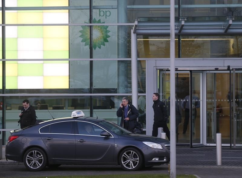 © Reuters. Men leave BP's North Sea Headquarters in Aberdeen