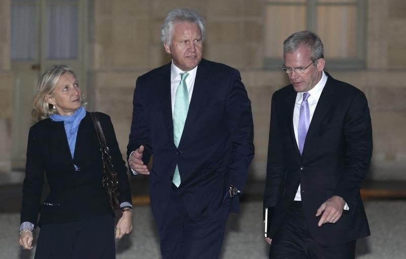 © Reuters. General Electric Chairman and CEO Immelt, Gaymard, the head of GE France, and Mark Hutchinson who was named to lead the integration of Alstom SA's energy units, arrive to attend a meeting at the Elysee Palace in Paris