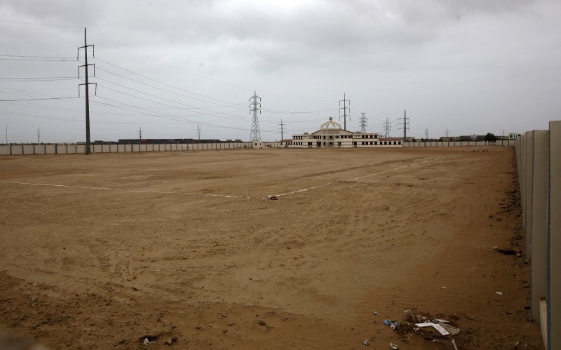 © Reuters. General view of an unfinished field at the FIFA Goal Project site in the Hawks Bay area of Karachi