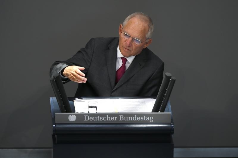 © Reuters. German Finance Minister Wolfgang Schaeublegestures as he gives a speech for a budget debate at the German national parliament in Berlin
