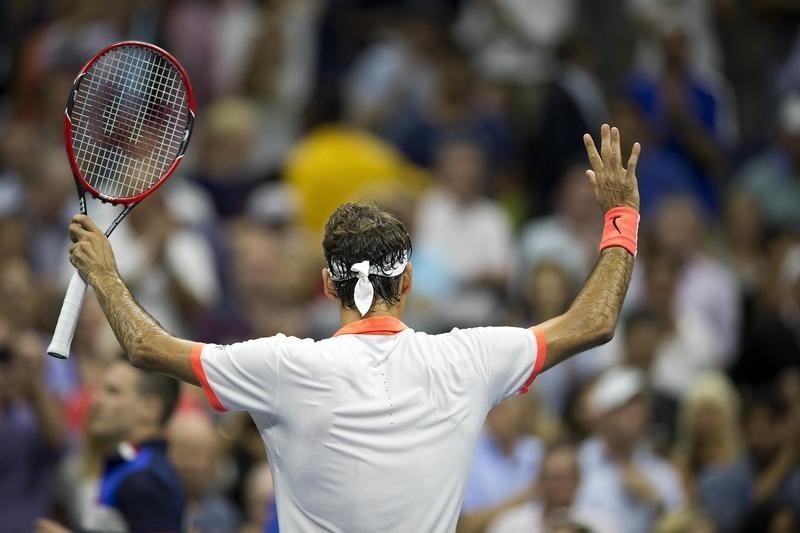 © Reuters. Federer y Wawrinka, duelo suizo en semifinales del Abierto de EEUU