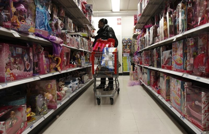 © Reuters. A woman shops for toys in a Kmart store in New York