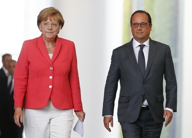 © Reuters. Chanceler alemã Merkel e presidente francês Hollande em Berlim