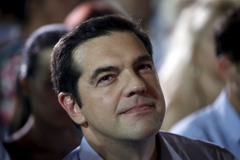 © Reuters. Former Greek PM and leader of leftist Syriza party Tsipras waits to deliver a speech during a pre-election rally in Athens