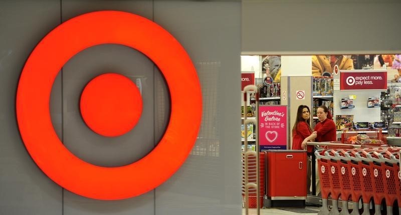 © Reuters. Employees work at a Target store at St. Albert