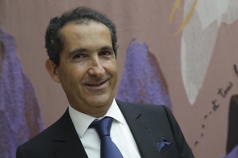 © Reuters. Patrick Drahi, Franco-Israeli businessman, Executive Chairman of cable and mobile telecoms company Altice and founder of Numericable attends a hearing at the French National Assembly in Pari