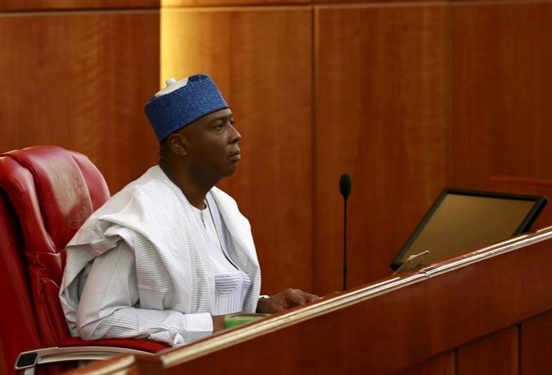 © Reuters. Senator Bukola Saraki looks on after being elected as the senate president of the 8th Nigeria Assembly in Abuja