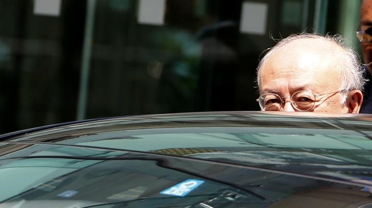 © Reuters. International Atomic Energy Agency director-general Amano leaves venue for nuclear talks in Vienna