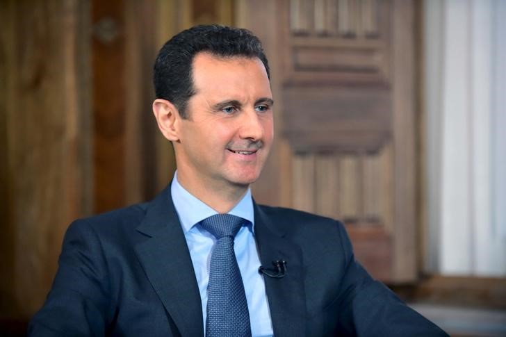 © Reuters. Syria's President Bashar al-Assad answers questions during an interview with al-Manar's journalist Amro Nassef, in Damascus