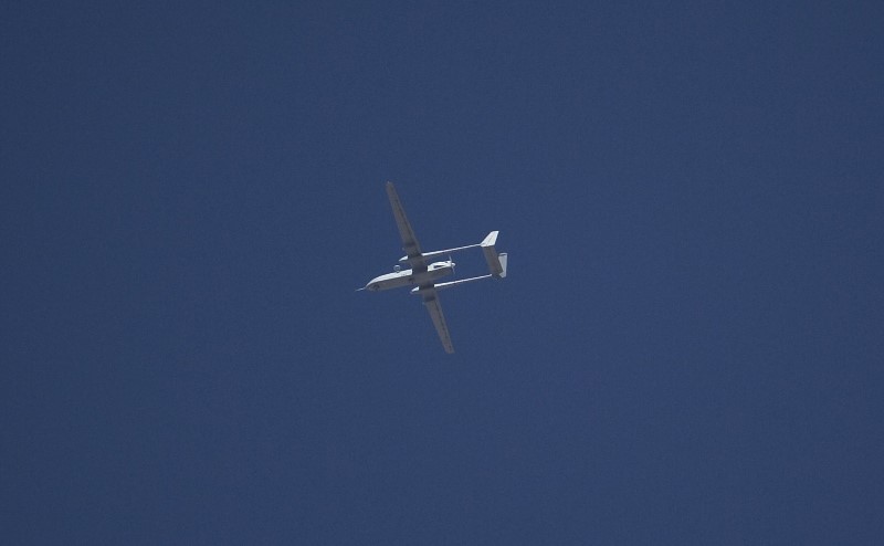 © Reuters. File photo of an Israeli drone flying over the West Bank city of Hebron