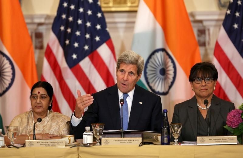 © Reuters. US Secretary of State Kerry participates with Indian minister Swaraj and Commerce Secretary Pritzker at US-India Strategic & Commercial Dialogue at the State Department in Washington