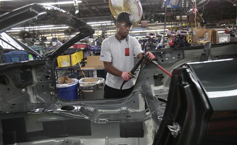 © Reuters. The frame of a 2015 Ford Mustang vehicle moves down the production line at the Ford Motor Flat Rock Assembly Plant in Flat Rock, Michigan,