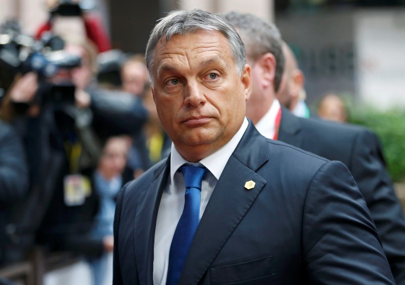 © Reuters. Hungarian Prime Minister Orban arrives at a European Union leaders extraordinary summit on the migrant crisis, in Brussels