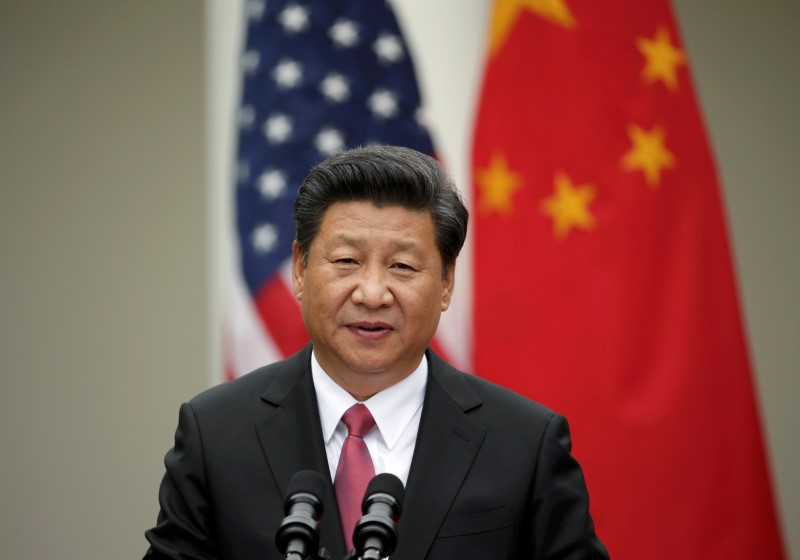 © Reuters.  Chinese President Xi addresses joint news conference in the Rose Garden of the White House in Washington