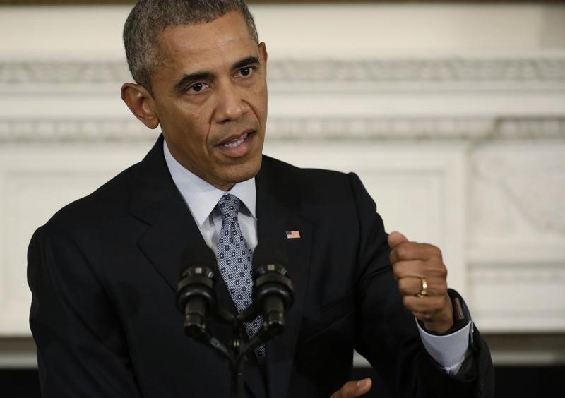 © Reuters. U.S. President Barack Obama addresses news conference in the State Dining Room at the White House in Washington