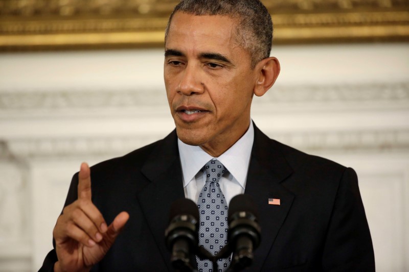 © Reuters. U.S. President Barack Obama addresses a news conference in the State Dining Room at the White House in Washington