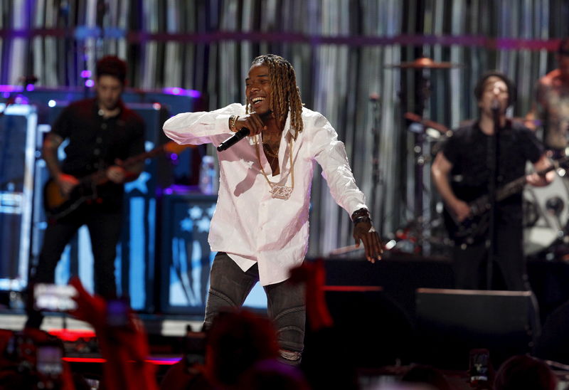 © Reuters. Fetty Wap performs with Fall Out Boy during the second night of the 2015 iHeartRadio Music Festival at the MGM Grand Garden Arena in Las Vegas