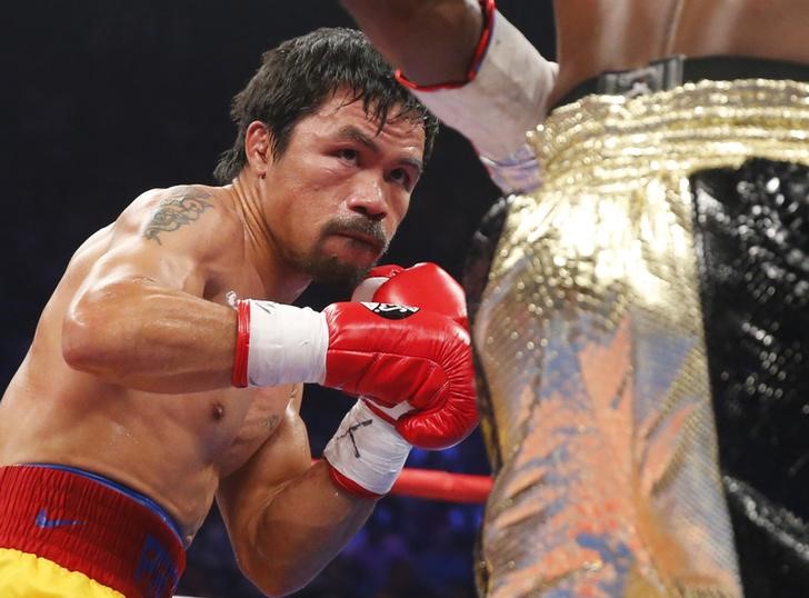 © Reuters. Manny Pacquiao em luta contra  Floyd Mayweather, nos Estados Unidos