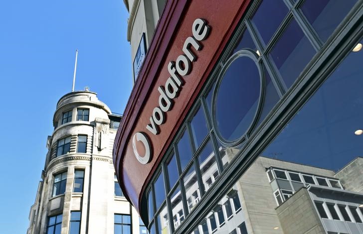 © Reuters. Branding for Vodafone is seen on the exterior of a shop in London, Britain