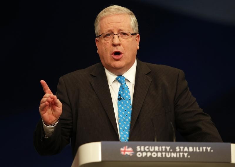 © Reuters. Britain's Transport Secretary Patrick McLoughlin gestures as he delivers his keynote address at the Conservative Party Conference in Manchester