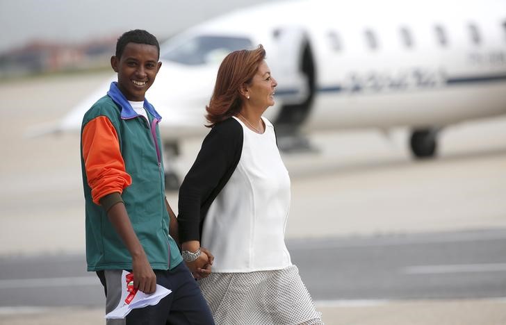 © Reuters. إيطاليا ترسل 19 إريتريا للسويد لطلب الهجرة بموجب خطة أوروبية