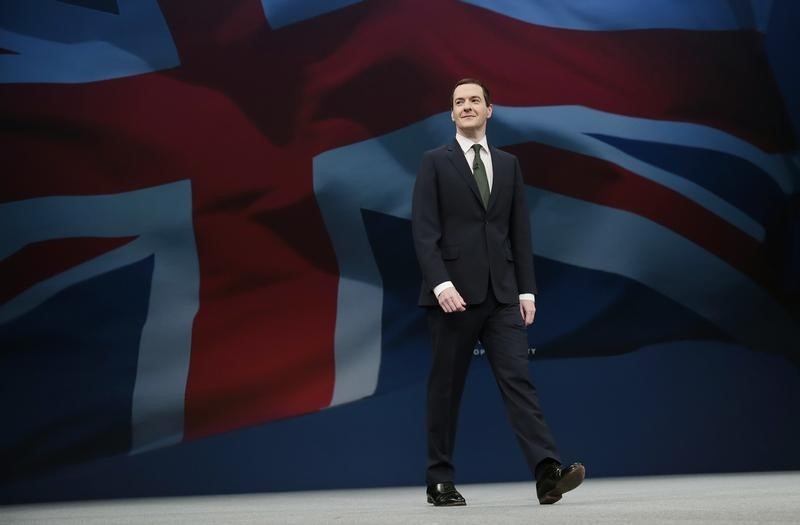 © Reuters. Britain's Chancellor of the Exchequer George Osborne arrives to deliver his keynote speech at the annual Conservative Party Conference in Manchester