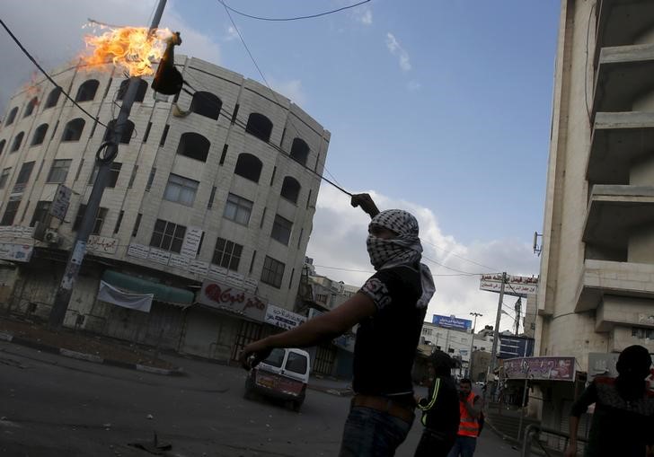 © Reuters. Tropas israelíes matan a cinco palestinos; se aviva la ola de violencia 