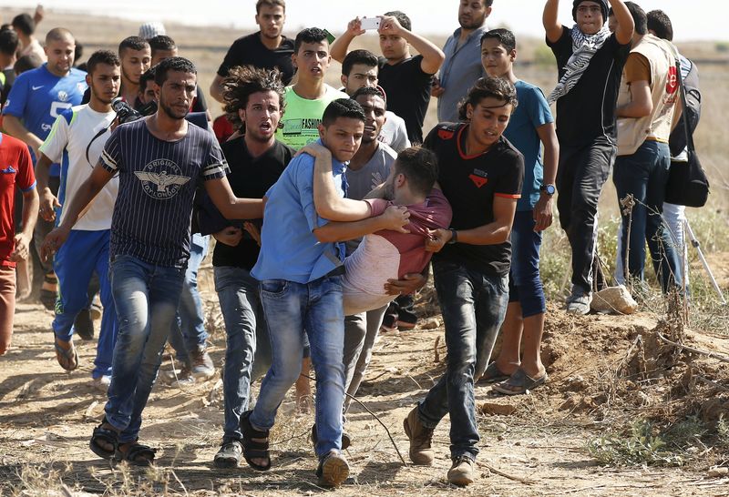 © Reuters. LES VIOLENCES ENTRE ISRAÉLIENS ET PALESTINIENS SE PROPAGENT À LA BANDE DE GAZA