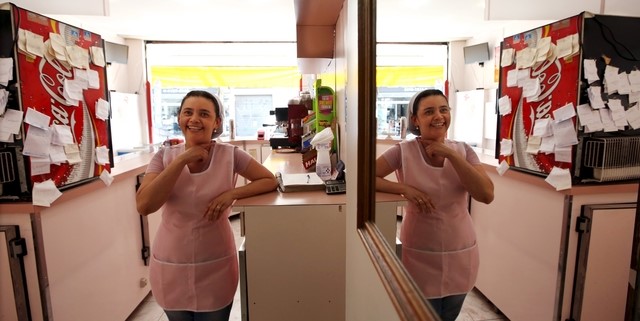 © Reuters. Lucinelia de Jesus Souza, poses for Reuters in her coffee shop in Sao Bernardo do Campo, Brazil