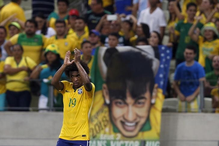 © Reuters. Willian comemorando vitória contra a Venezuela em Fortaleza