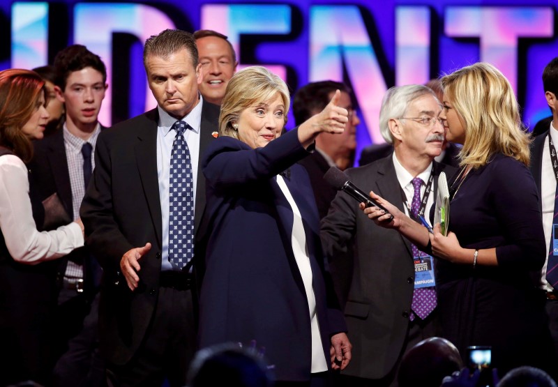 © Reuters. Democratic presidential candidate Hillary Clinton gives a thumbs up to supporters at the end of the first official Democratic candidates debate of the 2016 presidential campaign in Las Vegas