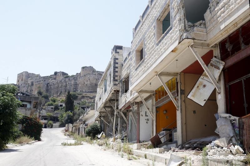 © Reuters. Casas danificadas na cidade de Homs, na Síria