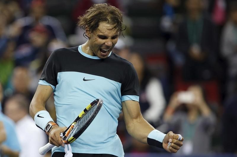 © Reuters. Nadal, Djokovic y Murray avanzan a cuartos de final en Shanghái