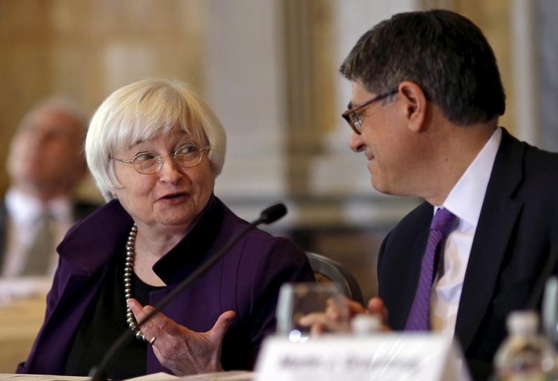 © Reuters. Federal Reserve Chair Yellen chats with Treasury Secretary Lew as they attend a meeting of the FSOC at the Treasury Department in Washington