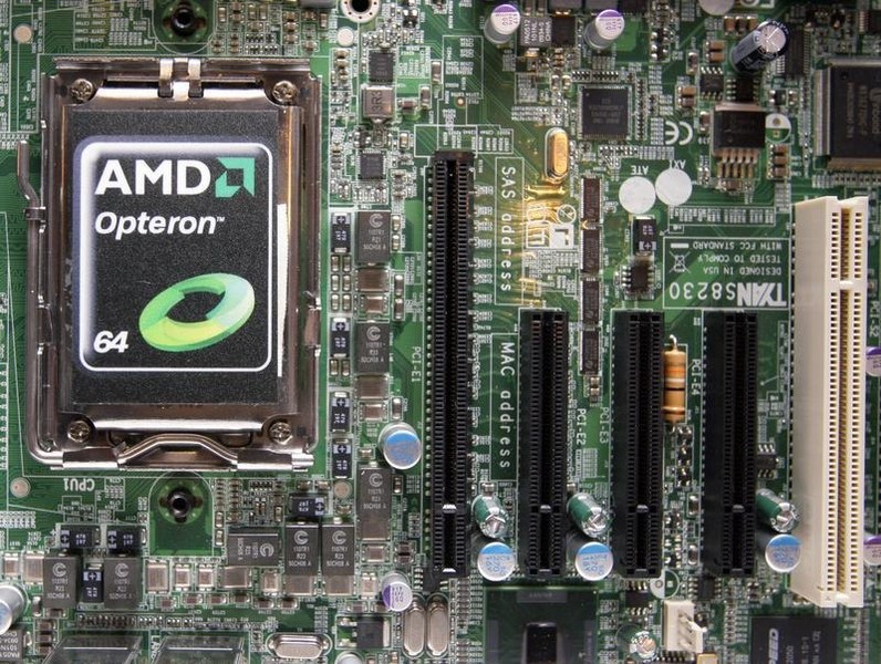 © Reuters. A new AMD Opteron 6000 series processor is seen on a motherboard during a product launch in Taipei