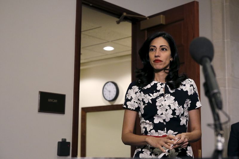 © Reuters. Huma Abedin, aide to Hillary Clinton, delivers a statement after meeting with the House Select Committee on Benghazi at the U.S. Capitol in Washington