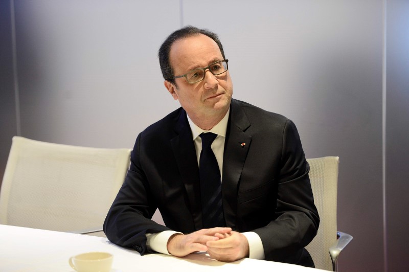 © Reuters. HOLLANDE PRÔNE UNE POSITION COMMUNE SUR LE COMPTE D'ACTIVITÉ