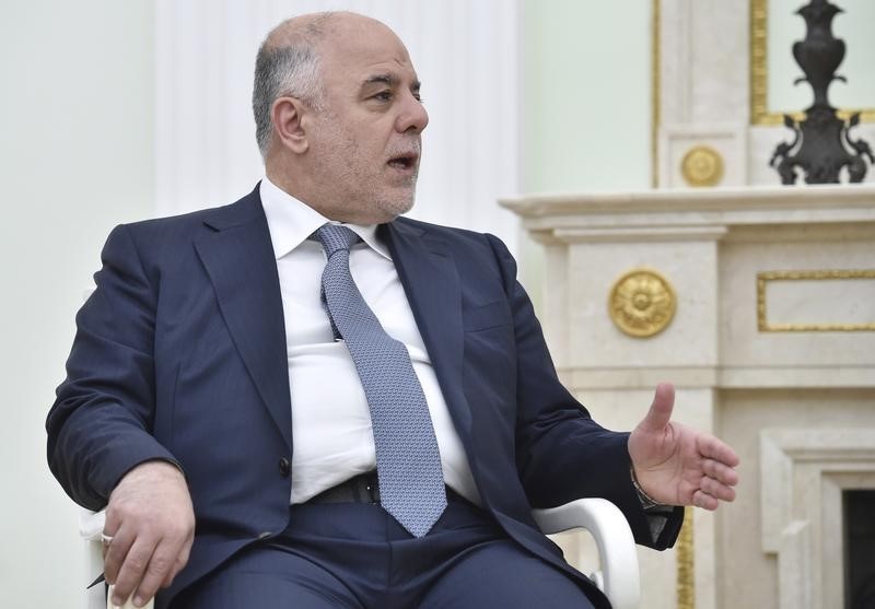 © Reuters. التحالف العراقي الحاكم وفصائل شيعية تحث رئيس الوزراء على طلب غارات روسية