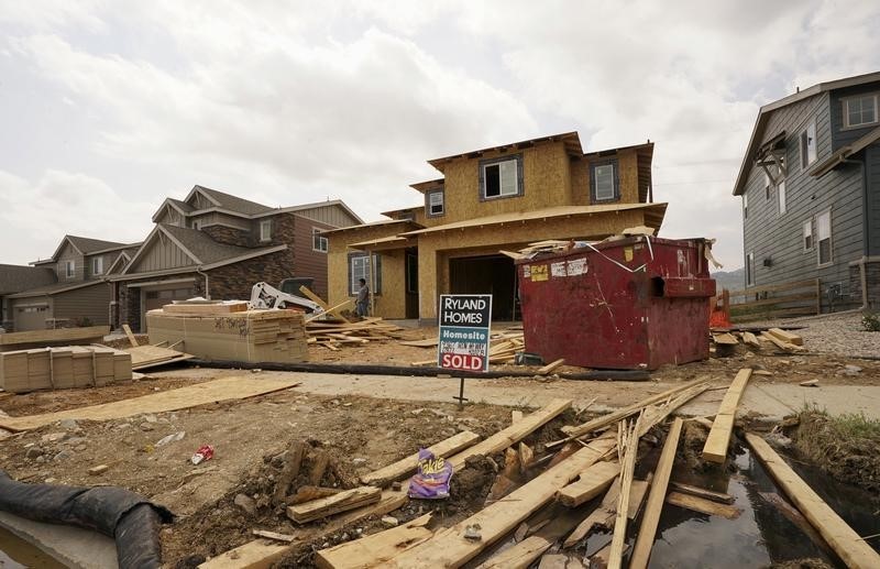 © Reuters. A house under construction has a sold sign out front in the Candelas development in the northwest Denver suburb of Arvada