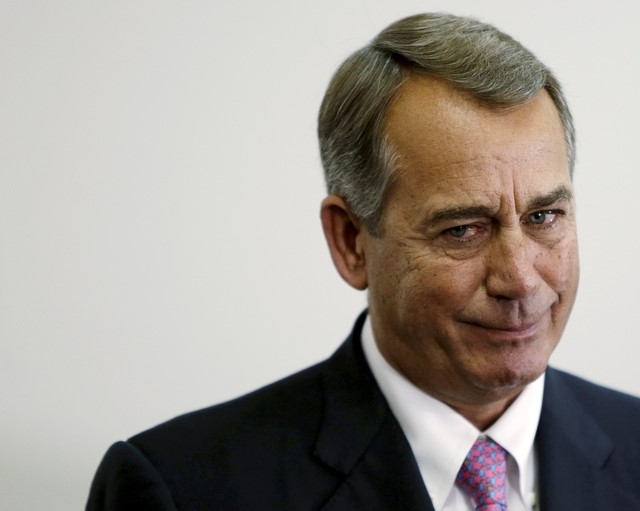 © Reuters. Outgoing Speaker of the House Boehner listens to accolades during news conference on the two-year budget deal with the White House in Washington 