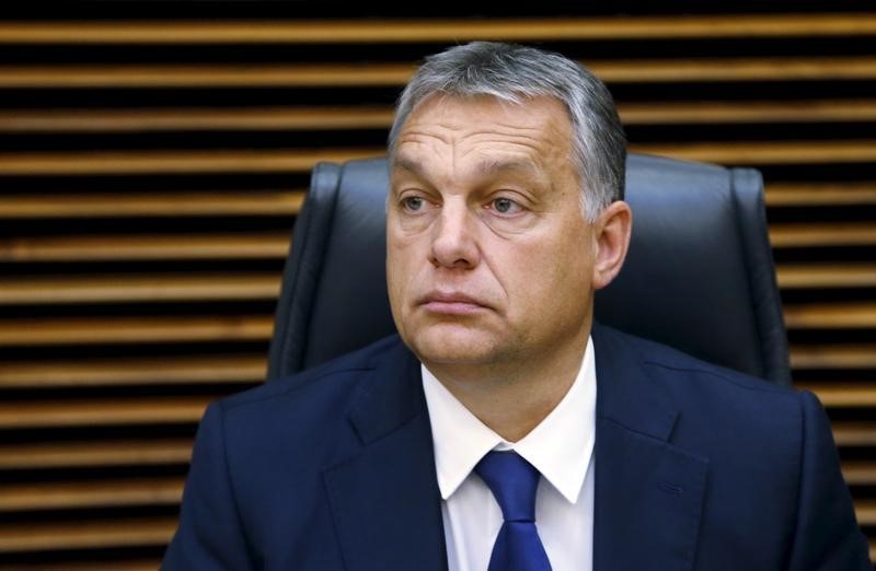 © Reuters. Hungary's PM Orban waits for the start of a meeting over the Balkan refugee crisis with leaders from central and eastern Europe in Brussels