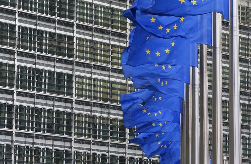 © Reuters. European flags are hung outside the European Commission headquarters in Brussels