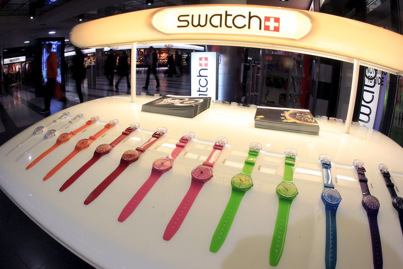 © Reuters. File photo of Swatch watches on display in front of a shop at the central station in Zurich