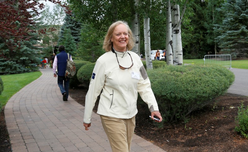 © Reuters. Hewlett-Packard CEO Meg Whitman walks at the annual Allen and Co. conference in Sun Valley