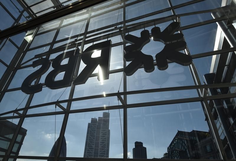 © Reuters. The City of London business district is seen through windows of the Royal Bank of Scotland headquarters in London