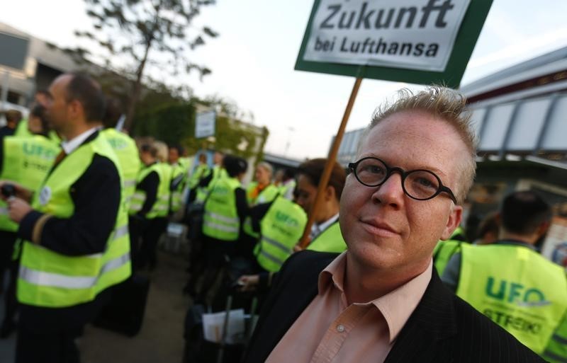 © Reuters. Head of Lufthansa cabin crew union Baublies poses for a picture at a strike in Frankfurt