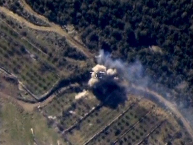 © Reuters. Frame grab from footage released by Russia's Defence Ministry shows airstrikes carried out by Russian air force in Syria