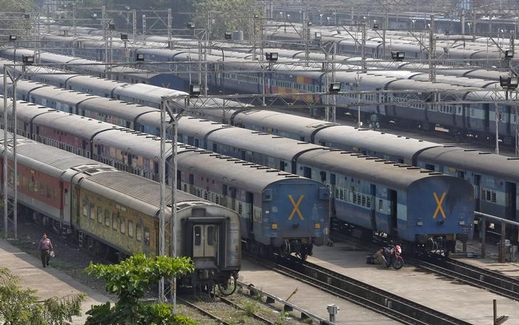 © Reuters. Parked passengers trains are seen at a railway station in Mumbai